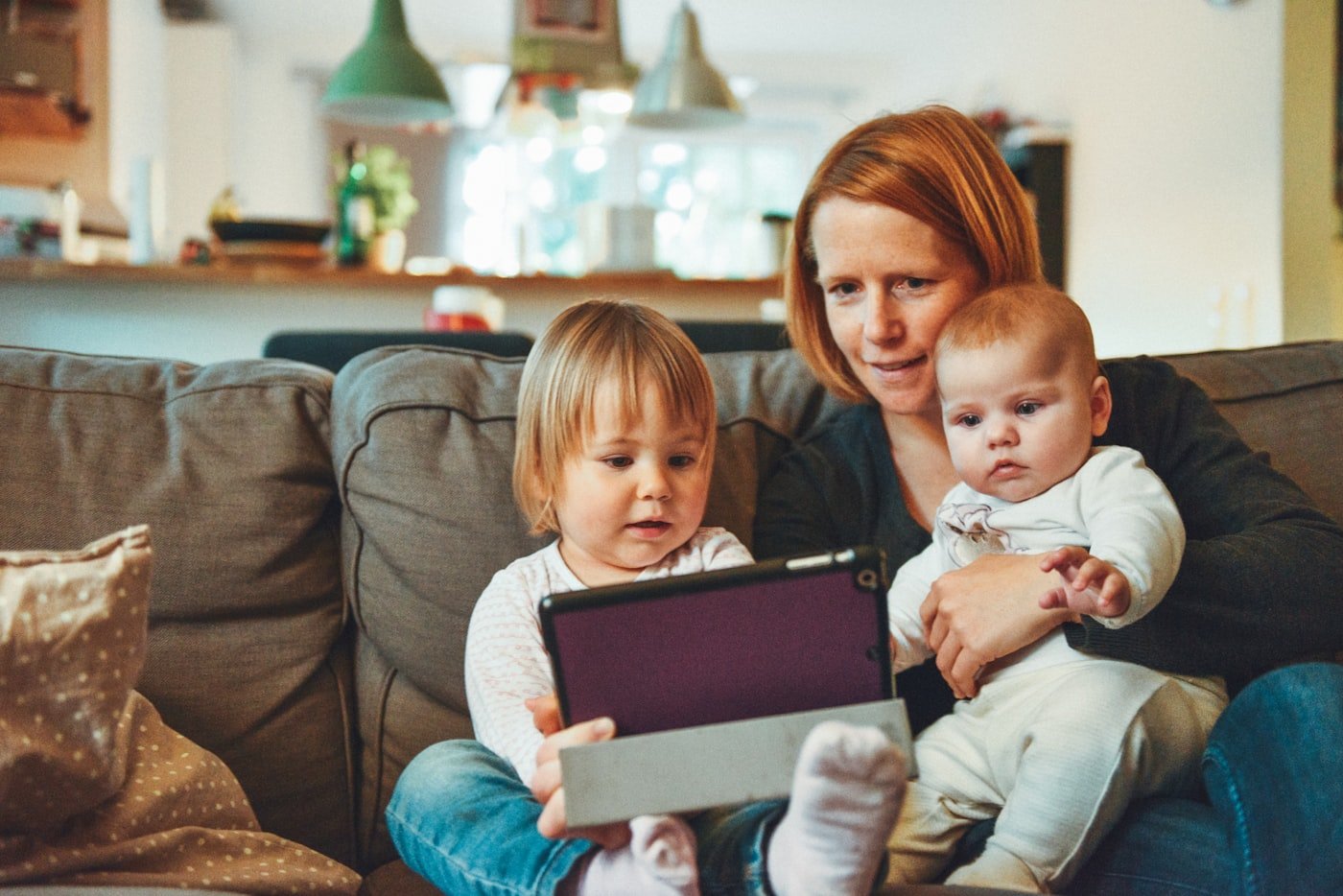 First home buyers reviewing their options with an adviser